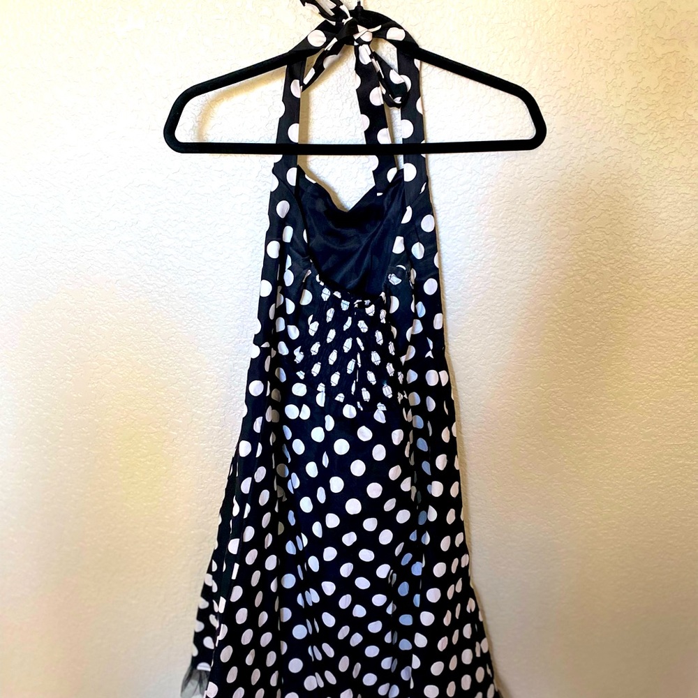 This is a fun black and white polka dot dress fit any occasion!